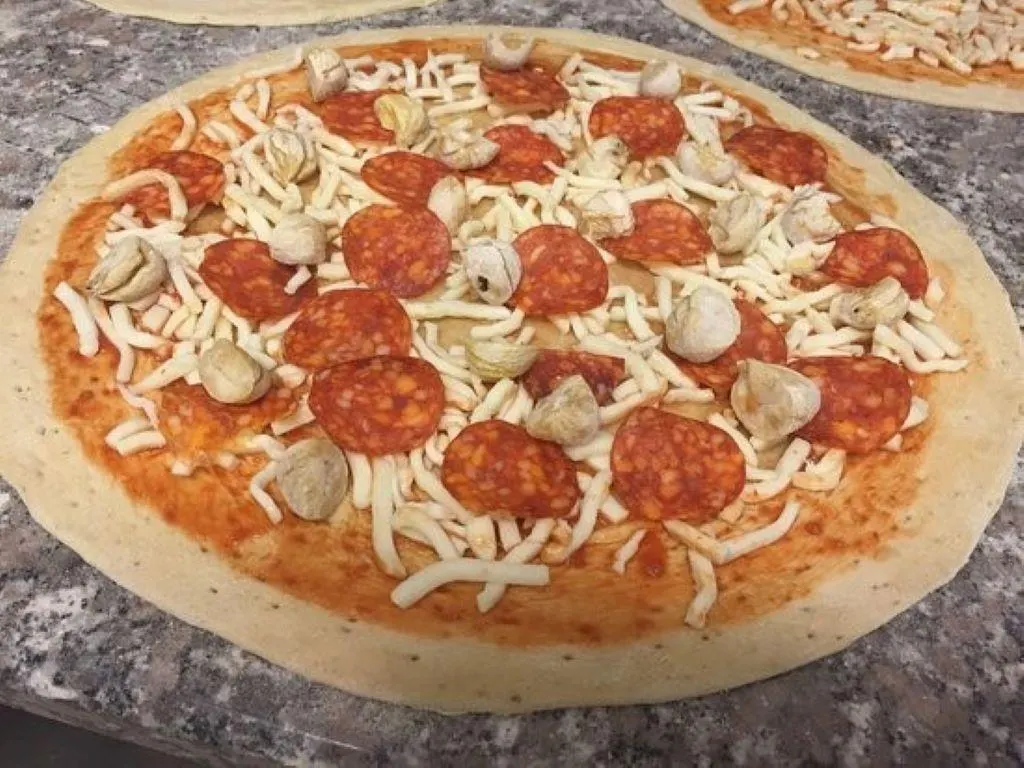 Pizza al taglio e da asporto  "Pizza  Mania"
